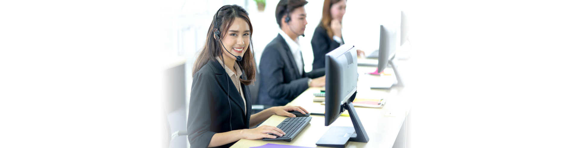 Call center worker accompanied by her team